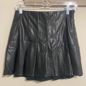 Black pleated leather skirt